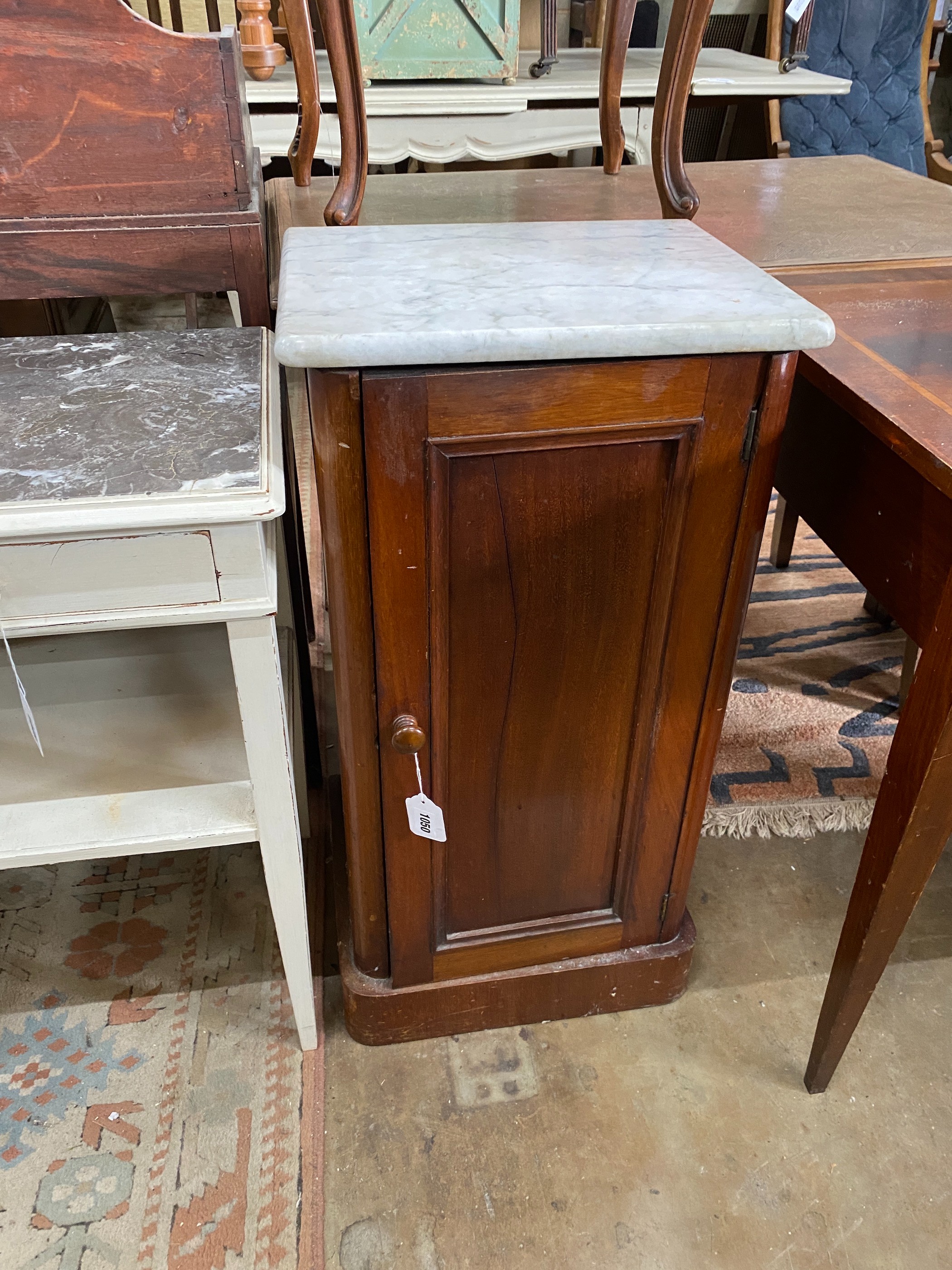 A Victorian mahogany white marble-topped bedside cabinet, width 39cm, depth 33cm, height 78cm